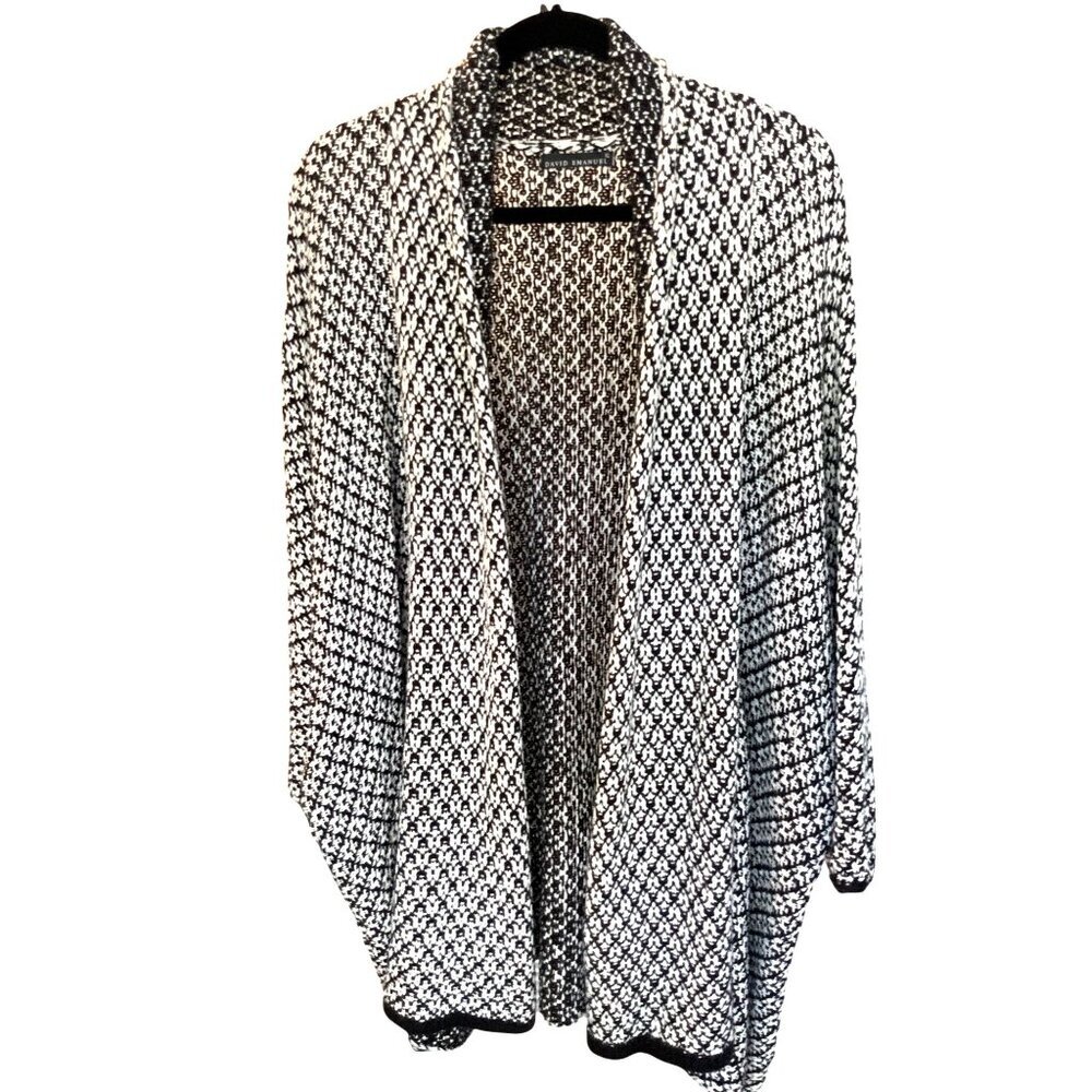 David Emanuel Cape. Part of the couple who designed Princess Diana’s wedding dre